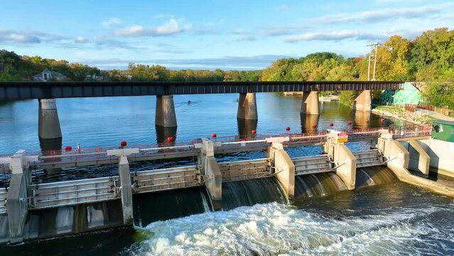 Aerial View of Argo Dam and Kayakers on Huron River at Golden Hour