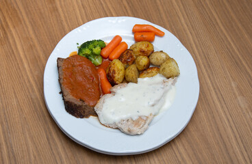 Pork steak with carrots and broccoli