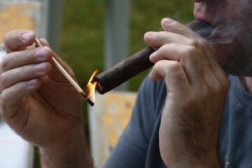 How To Properly Light A Cigar 