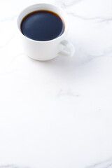 淹れたてのフレッシュで香りのよいコーヒーが入ったコーヒーカップ

