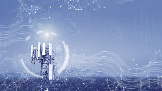 Telecommunications tower with 5G transmitter. Cellular base station with telecommunications transmitting antenna against technology background.