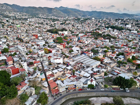 Drone-captured horizontal aerial view showcasing the vibrant and varied neighborhoods of Chilpancingo