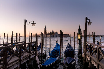 View of the Church of San Giorgio Maggiore, a 16th-century Benedictine church on the island of the same name, from the Riva degli Schiavoni waterfront in Venice, Italy - obrazy, fototapety, plakaty
