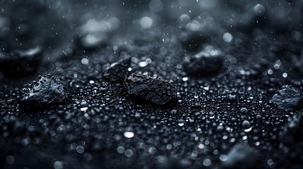 Rain Drops on Black Rocks in Tilt-Shift Style, To serve as a visually striking and conceptual image for designers, advertisers, and publishers - obrazy, fototapety, plakaty