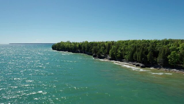 Drone aerial view of the blue waters of lake Michigan near door county