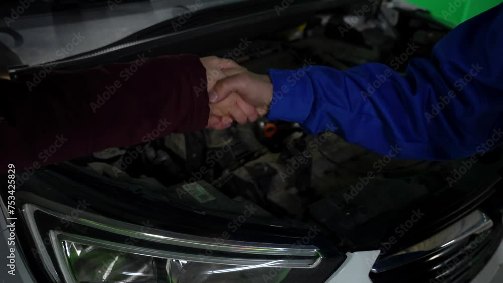 Aufkleber handshake between client and mechanic in front of car engine