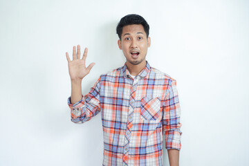 Naklejka premium Asian man smiling happy while giving five finger up symbol