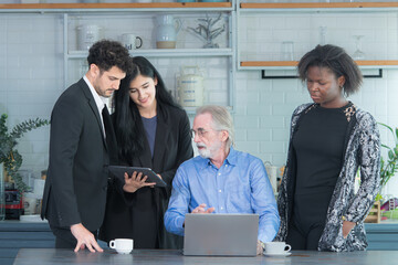 Simple meeting of small business owners, using their home as a workplace, talking and consulting with fun and smiles.