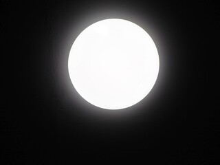 Ceiling light round,Large circular light bulb in the dark,Modern lighting for the room