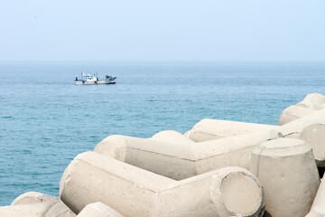 View of a fishing boat on the sea at the seaside