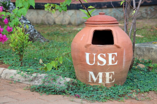 organic and eco friendly Dust bin made of clay. Creative and nature friendly way of collecting garbade in a park. 