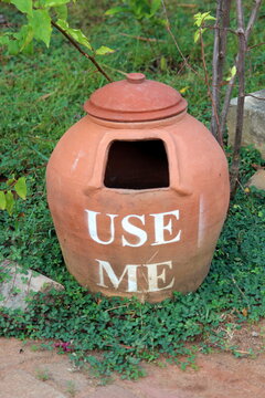 organic and eco friendly Dust bin made of clay. Creative and nature friendly way of collecting garbade in a park. 