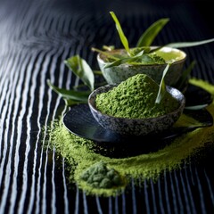 Variety of matcha tea served with sencha and matcha powder over dark wooden background