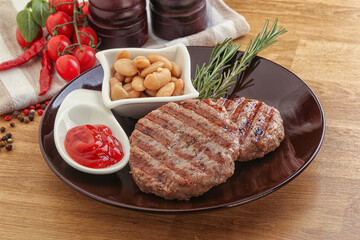 Grilled beef burger cutlet with sauce