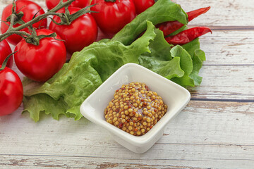 Mustard seeds sauce in the bowl