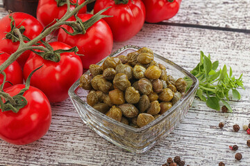 Marinated green capers in the bowl