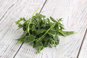 Green Arugula heap over background