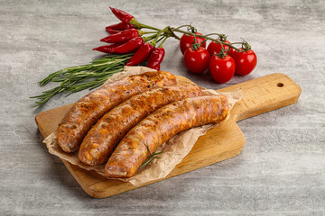 Raw sausages with spices and herbs