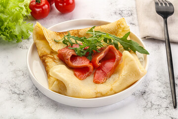 Russian pancake with salmon fish