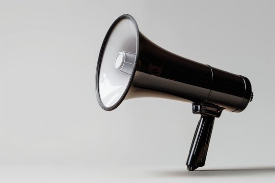 Black Loudspeaker on white background with copy space. Loud Speaker on banner for sales and advertisements with empty place for text. Megaphone announce elements for collages in y2k style