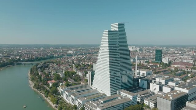 Aerial flies backwards from Kleinbasel revealing the Rhine river