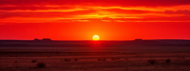Zelfklevend Fotobehang The Sun Sets Over a Field in the Distance © Usman