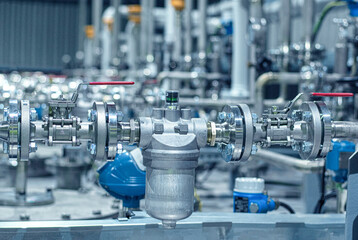 Industrial equipment. Pipes, valves and filter on the stainless steel production line of additive,...