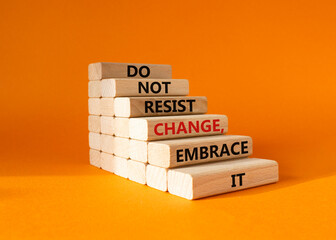 Do not resist change embrace it symbol. Concept words Do not resist change embrace it on wooden...