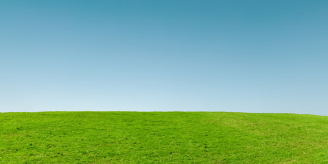 草原と青空の風景の背景画像