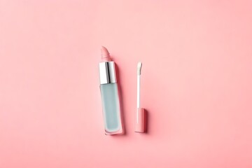 Top view on Lipgloss glass bottle isolated on flat pastel pink background with copy space.