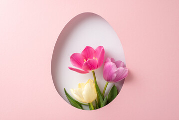 Easter charm visual: top view of colorful tulips, peeking through an egg-like opening on a pastel...