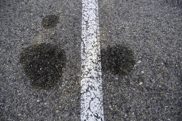 Asphalt road with oil stains - 753483650