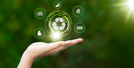 ESG icon with Hand on green nature background. Environment society and governance concept.