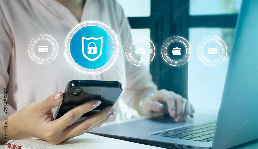 Poster cyber security technology, data protection concept. user using mobile phone and laptop computer with