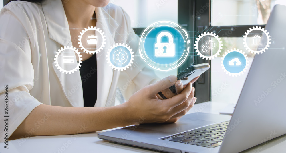 Poster cyber security technology, data protection concept. businesswoman using mobile phone and laptop comp