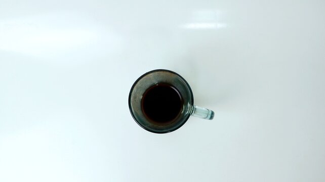 a glass of coffee that has been drunk