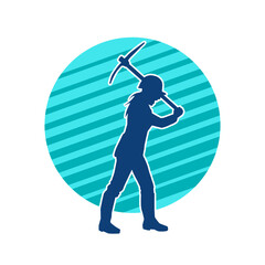 Silhouette of a woman in worker costume carrying pick axe tool in action pose. Silhouette of a female miner in action pose with pick axe tool.