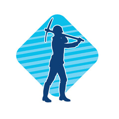 Silhouette of a woman in worker costume carrying pick axe tool in action pose. Silhouette of a female miner in action pose with pick axe tool.