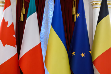 National flags of Ukraine, Canada, Italy, Belgium and the flag of the European Union during a...