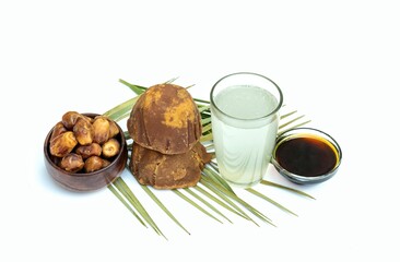 Date Palm Jaggery, Phoenix Dactylifera Fruit and Date Palm Tree Juice Isolated on White Background with Copy Space