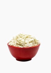 Poha or Flattened Rice in a Red Bowl Isolate on White Background with Copy Space, Also Known as Chira, Sira or Chivda