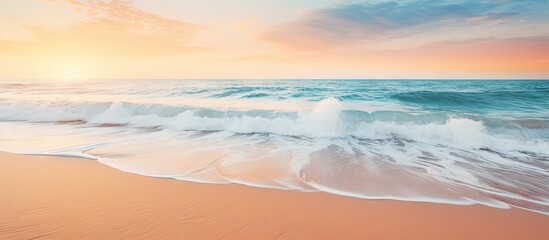 Fototapeta na wymiar Spectacular Sunset casting Golden Glow over Waves on a Serene Beach