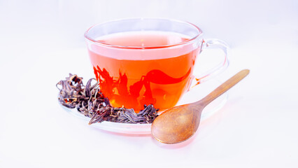 Herbal drink Hibiscus sabdaiffa L., Jamaica sorrel, Roselle dried in a clear glass cup. healthy .
