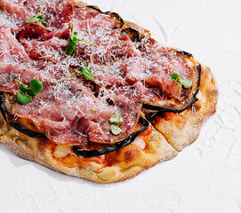 pizza with prosciutto parma ham with parmesan cheese