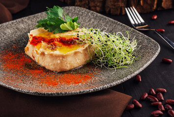 Hummus with olive oil and paprika