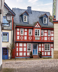 Picturesque colorful half-timbered house in Idstein, Hesse, Germany - obrazy, fototapety, plakaty