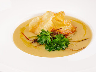 Soup of the pumkin with potato chips