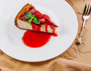 cheesecake with strawberry jam top view - obrazy, fototapety, plakaty