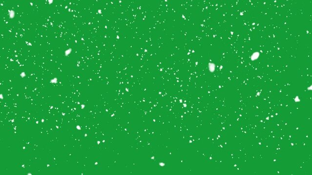 Snow falling on green background