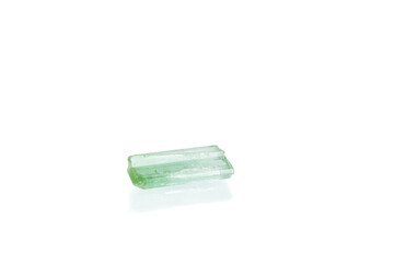 green tourmaline mineral stone macro on white background